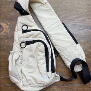 Free People Movement Renegade Sling Bag in Beige